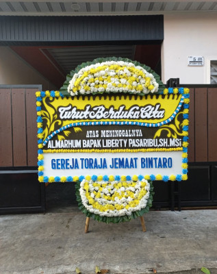 Papan Bunga Duka di Holuon